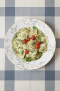 Spinach Ravioli with Labneh, Pesto, and Tomato🥟